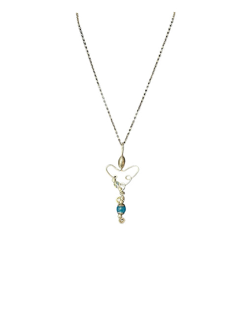 Sterling silver necklace with a heart shaped pendant/ gemstone. 